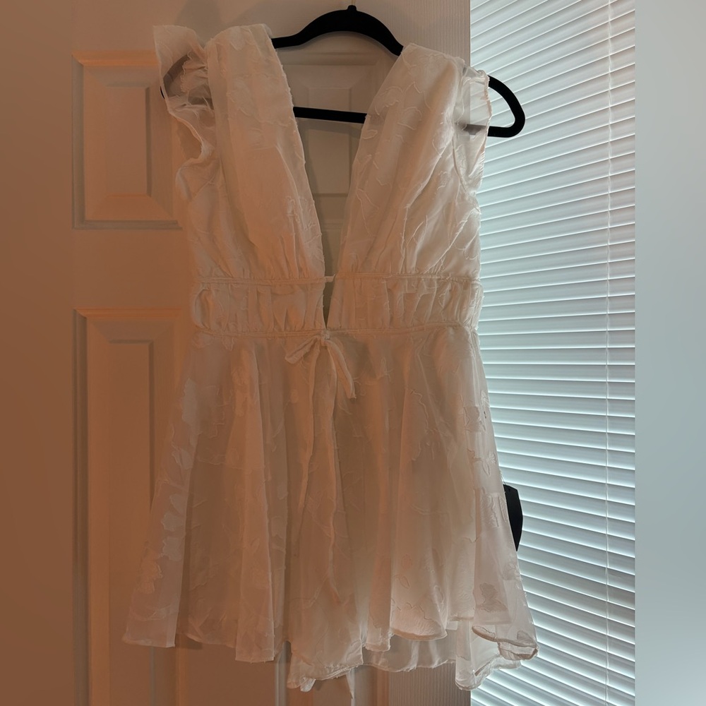 Lulu's Ivory Sleeveless Dress with Floral Design